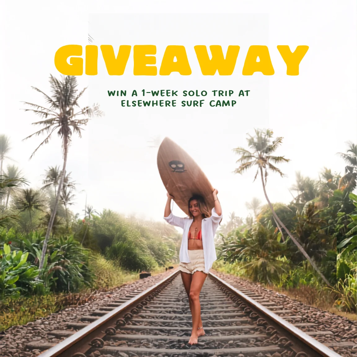 Solo female traveller carrying a surfboard in Bali for the Elsewhere Surf Camps giveaway